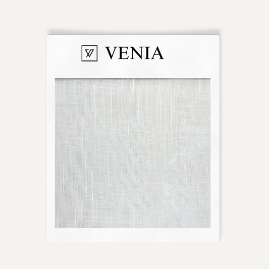 Textured white fabric sample with 'VENIA' branding on a white background