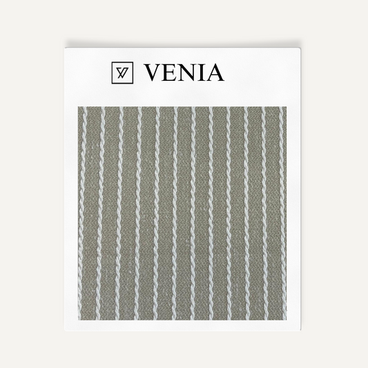 Textile sample with striped pattern and 'Venia' branding on a white background