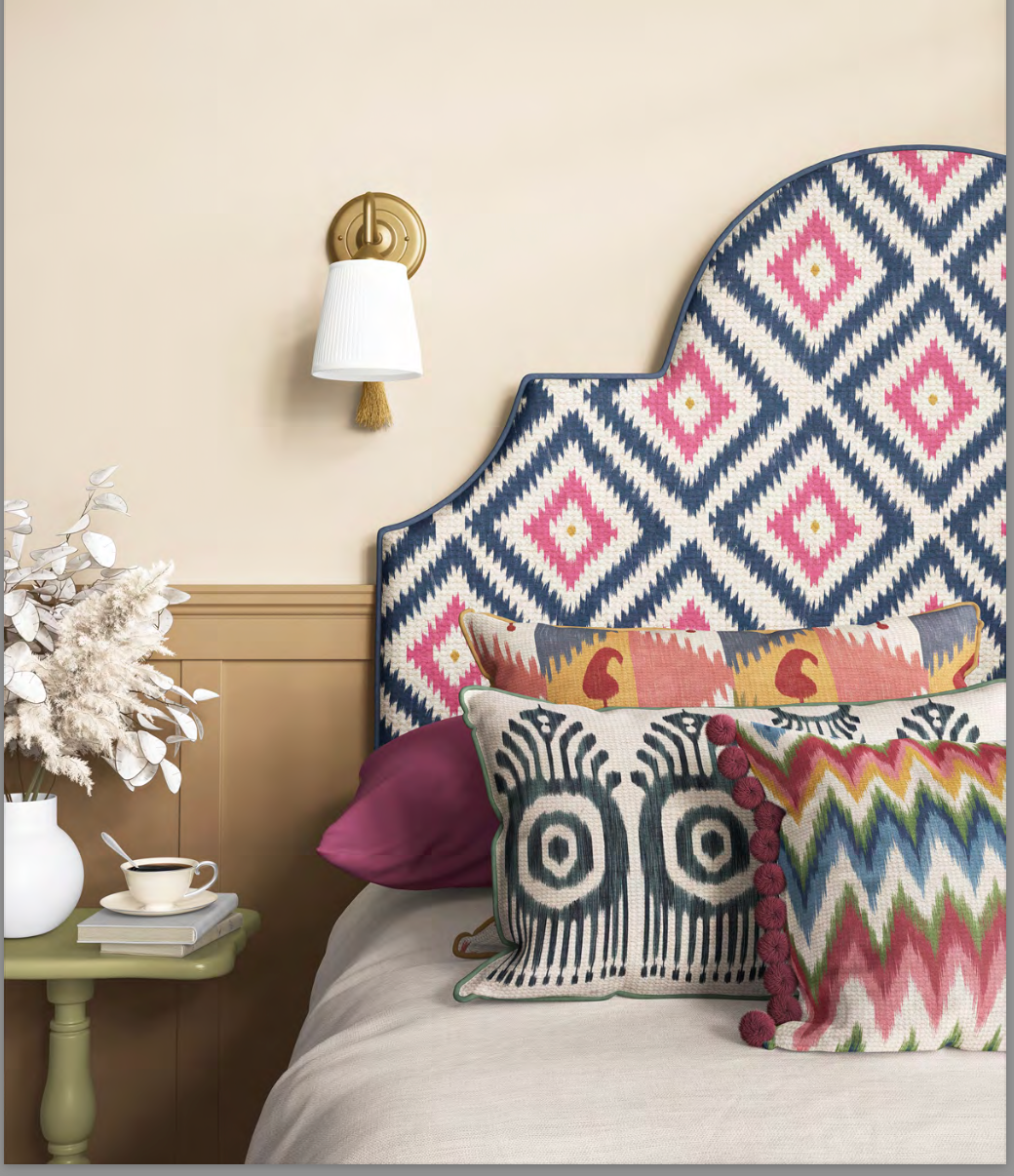 Decorative headboard with colorful geometric patterns in a bedroom setting.