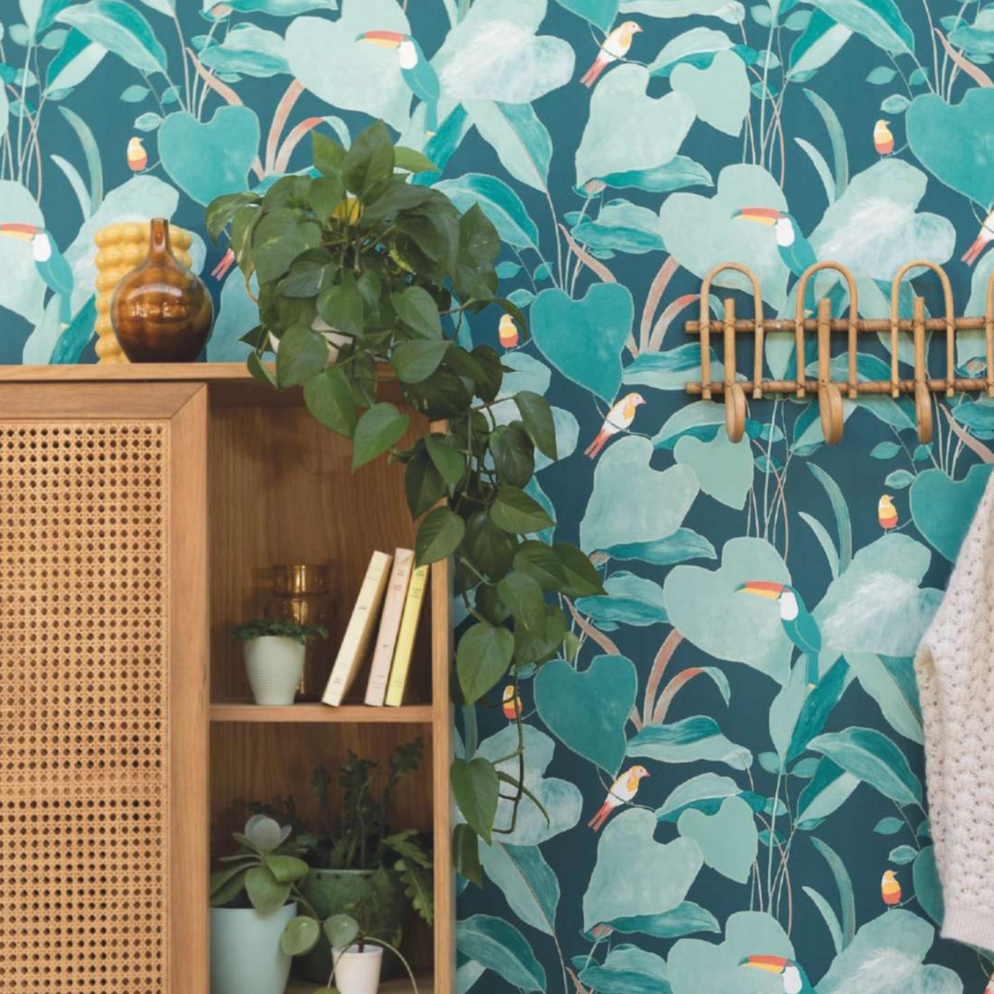 living room adorned with green leaves and birds wallpaper