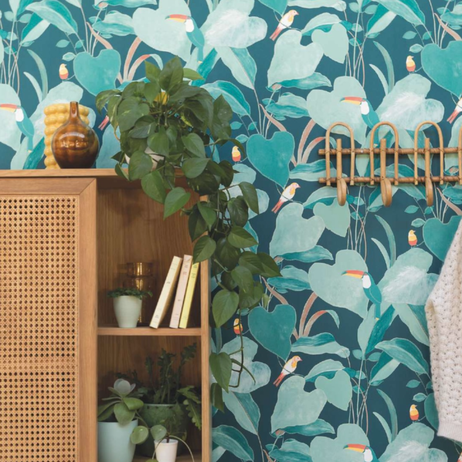 living room adorned with green leaves and birds wallpaper