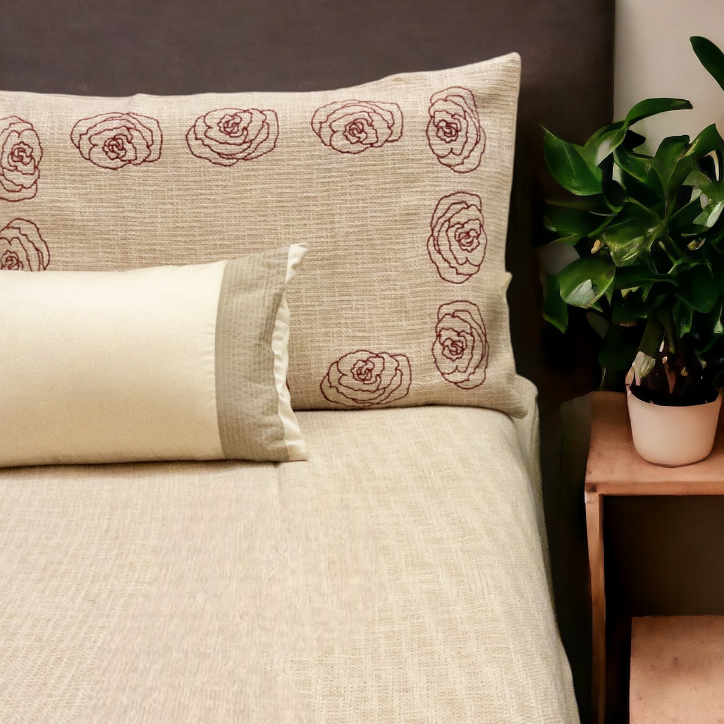A bedcover set, spread on a bed