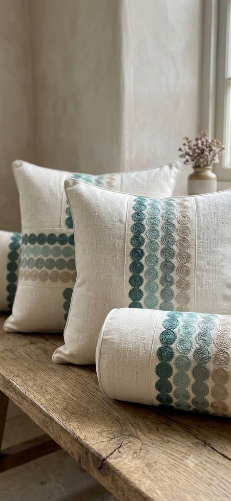 Close-up detail of blue circular embroidered trim
