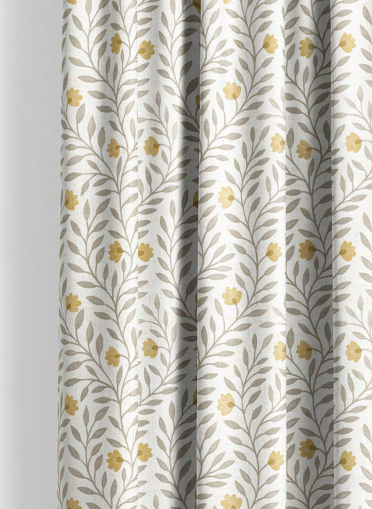 Close-up detail of yellow and grey cottage vine fabric