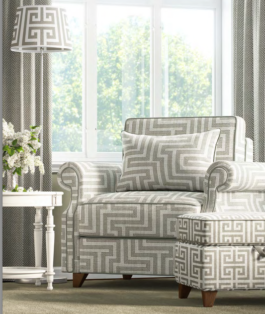 Close-up detail of ivory and greige deco maze III fabric