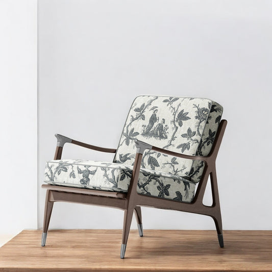 Charcoal folklore toile fabric on an accent chair