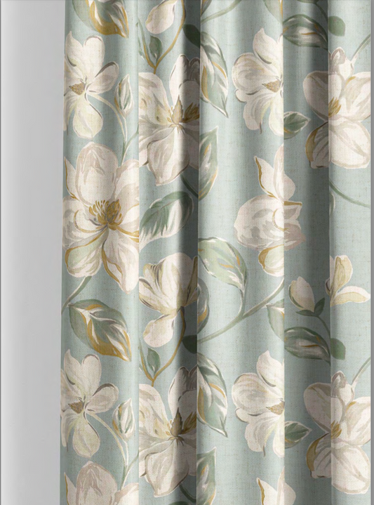 Close-up detail of aqua magnolia bloom fabric