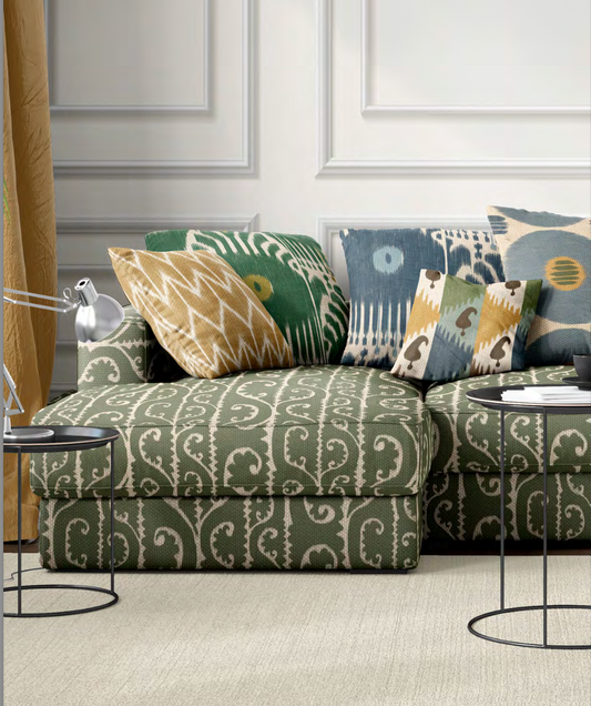 Close-up detail of green scrollwork fabric