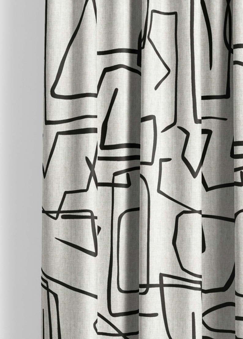Close-up detail of ivory and black sketch lines fabric