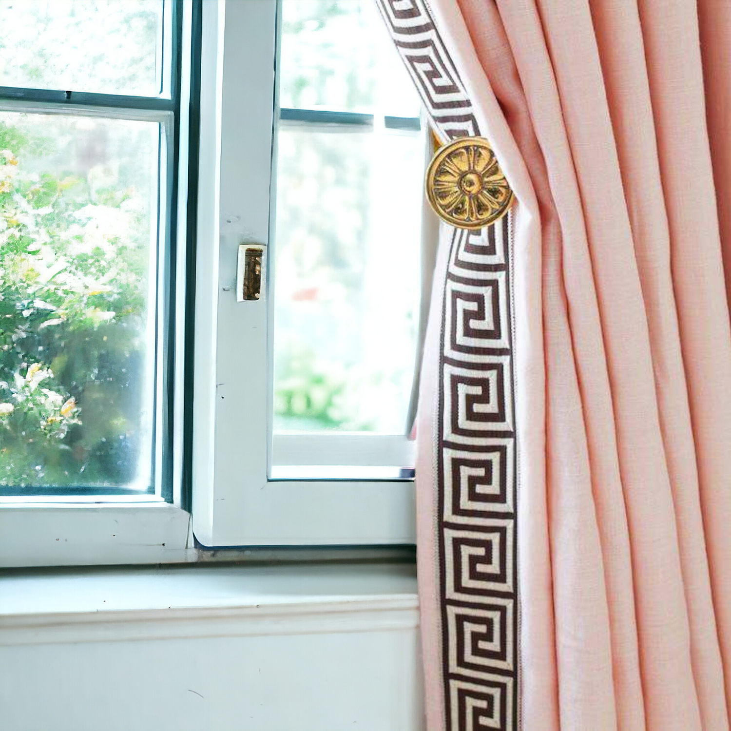 A pink curtain elevated by a beautiful designer border