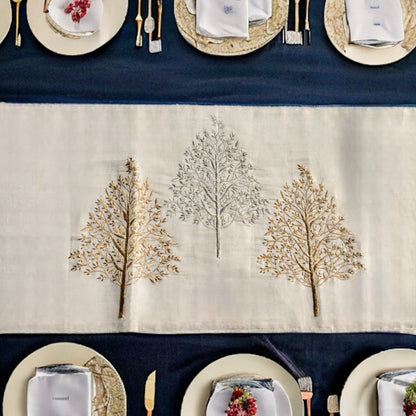 Luxury table runner with gold and silver embroidered work  placed on a dining table