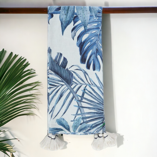 a blue and white printed throw