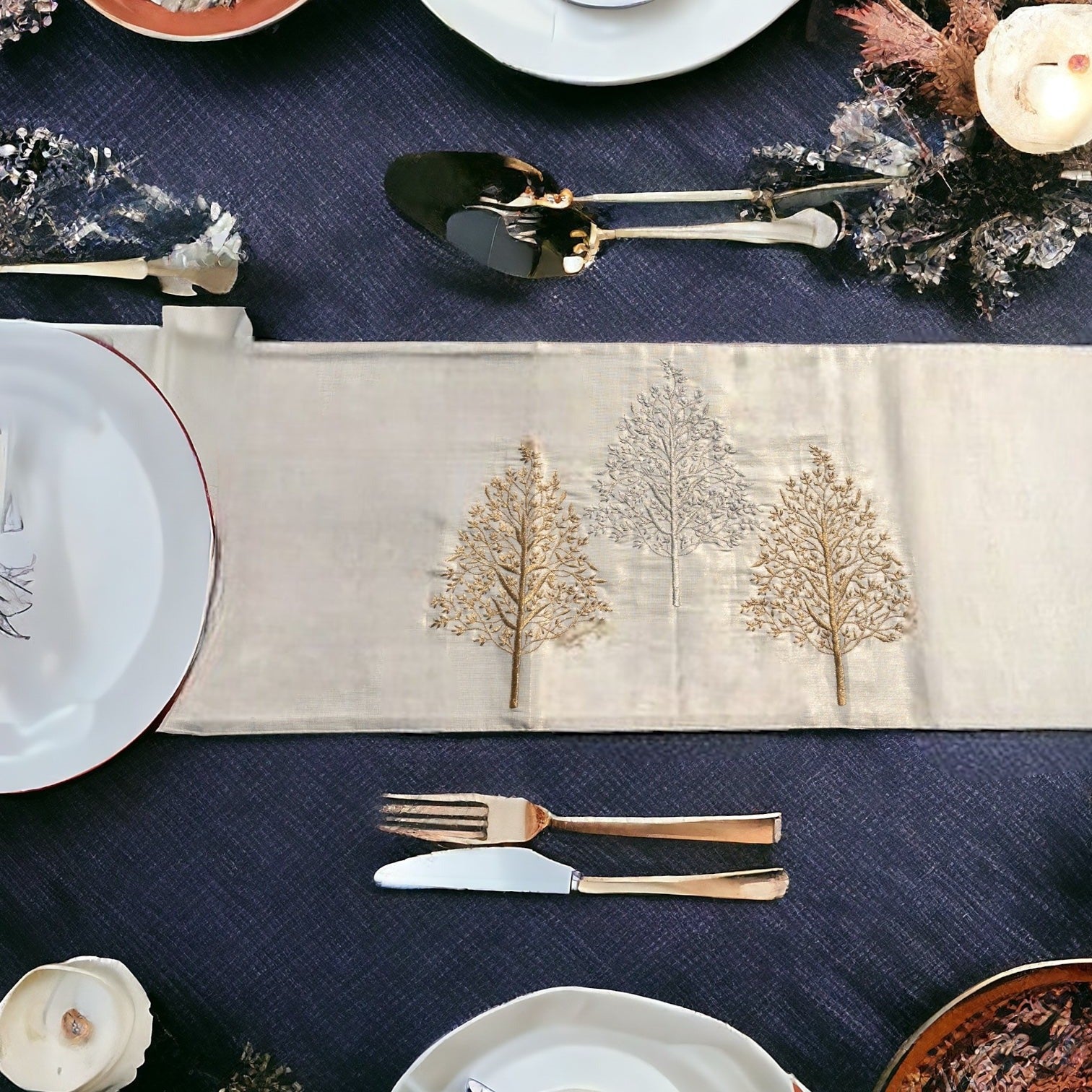 Luxury table runner with gold and silver embroidered work  placed on a dining table