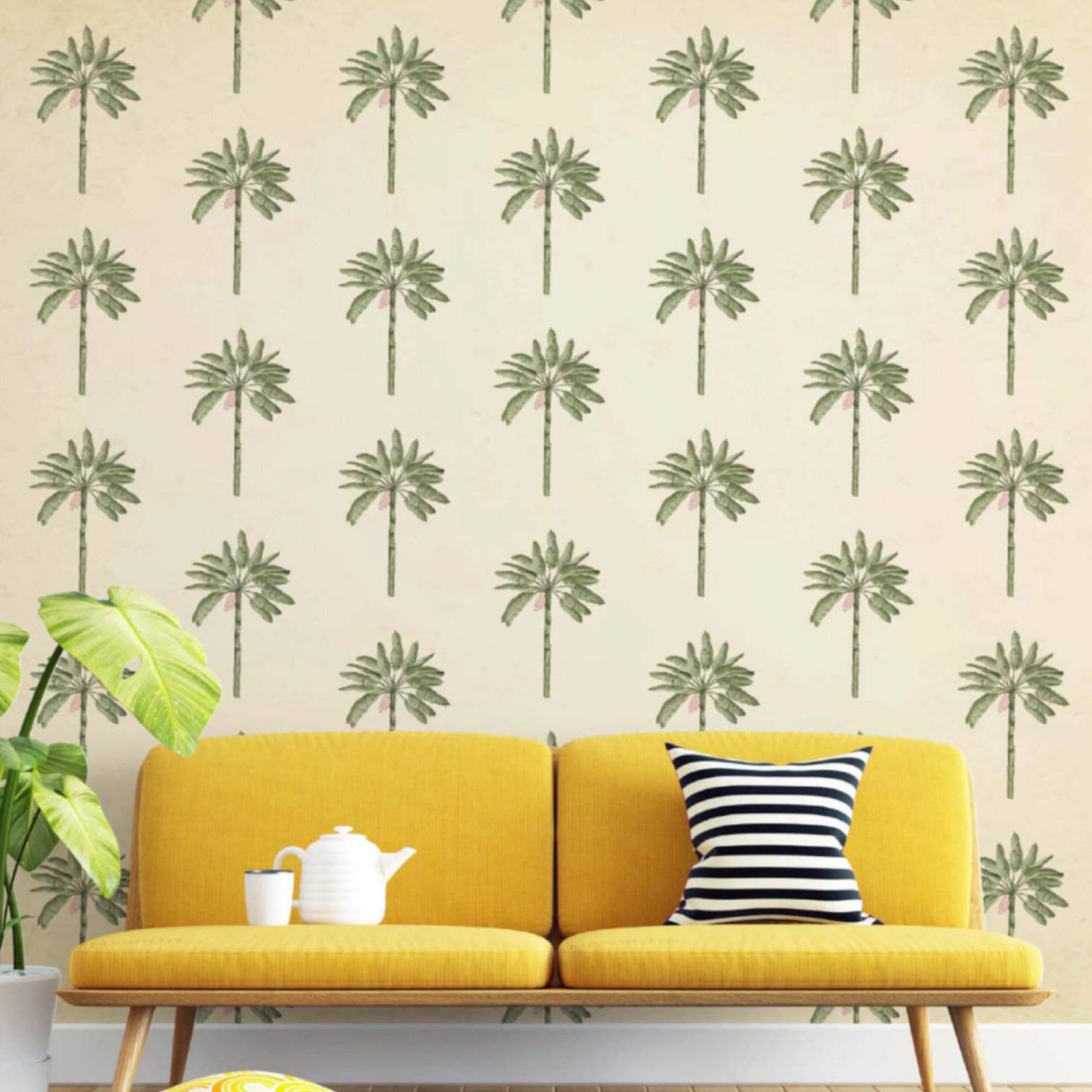 a wall adorned with beige wallpaper with green trees on it and a yellow dofa
