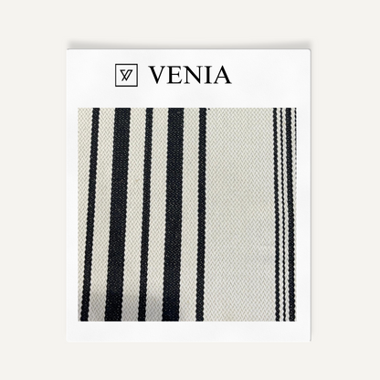 Abstract rhythm stripe black and white upholstery fabric swatch by Venia Home