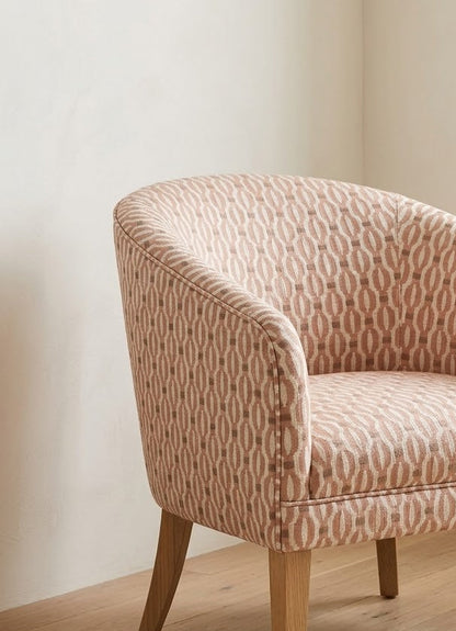 Close-up detail of warm pink align vertical pattern fabric