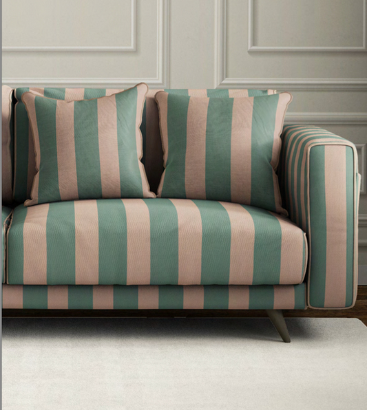 Close-up detail of sage and blush atelier stripe velvet fabric