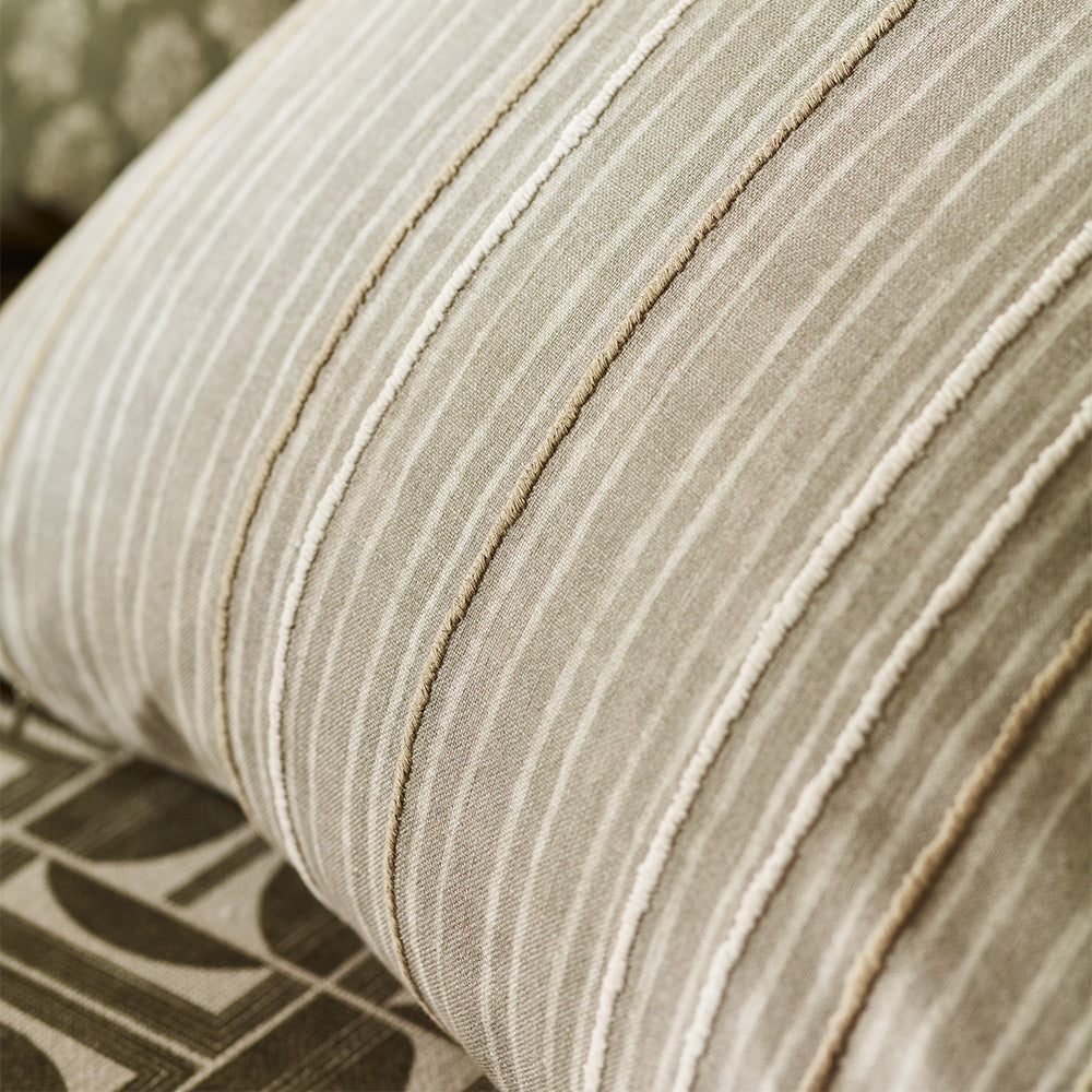 Grey and green chalk stripes fabric embroidery detail