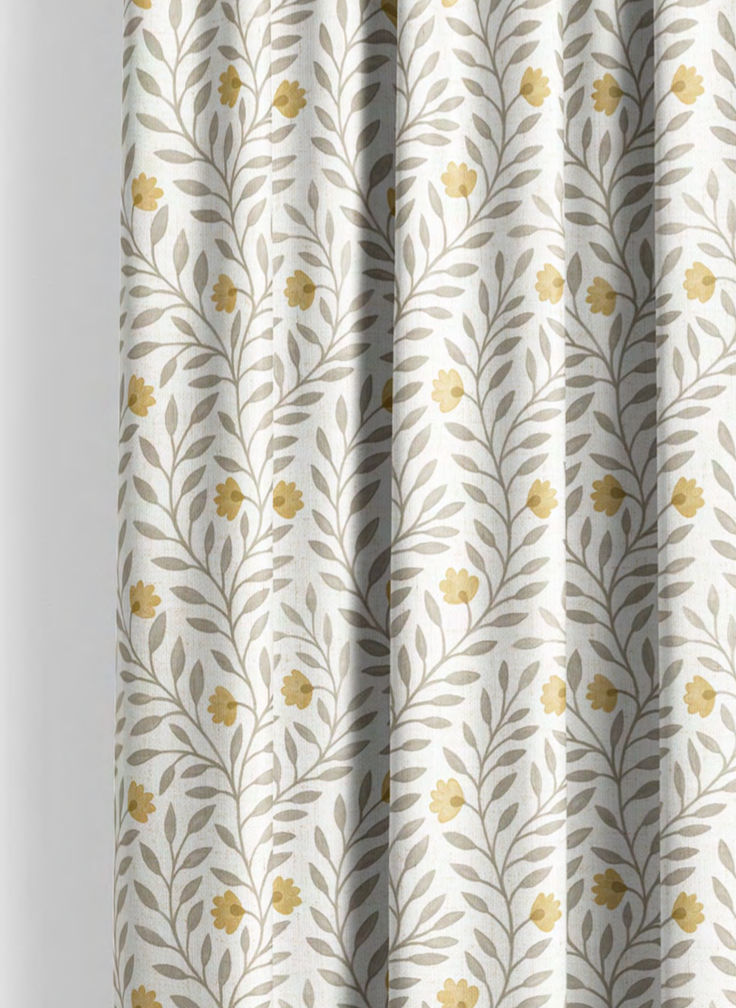 Close-up detail of yellow and grey cottage vine fabric