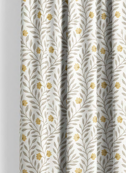 Close-up detail of yellow and grey cottage vine fabric