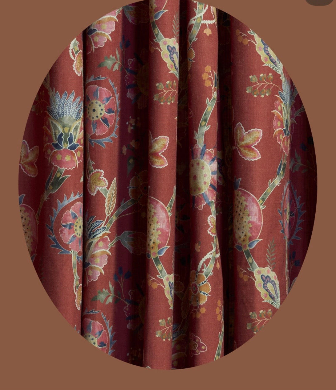 Crimson jacobean fabric on upholstered chair