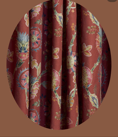 Crimson jacobean fabric on upholstered chair