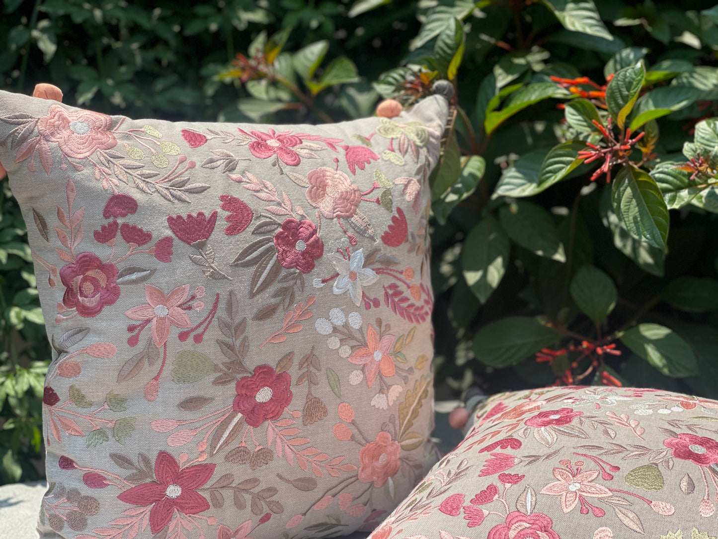 two elegant embroidered cushion covers with a subtle texture ideal for enhancing living room comfort