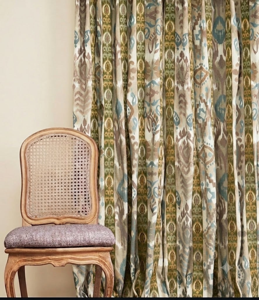 Close-up detail of olive green echoes of ikat fabric