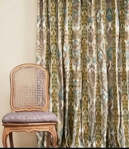 Close-up detail of olive green echoes of ikat fabric