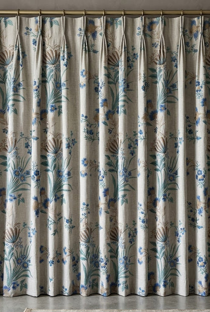 Ivory exotic eden fabric with blue flowers as curtain