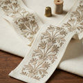 Fawn flowers embroidered trim swatch by Venia Home