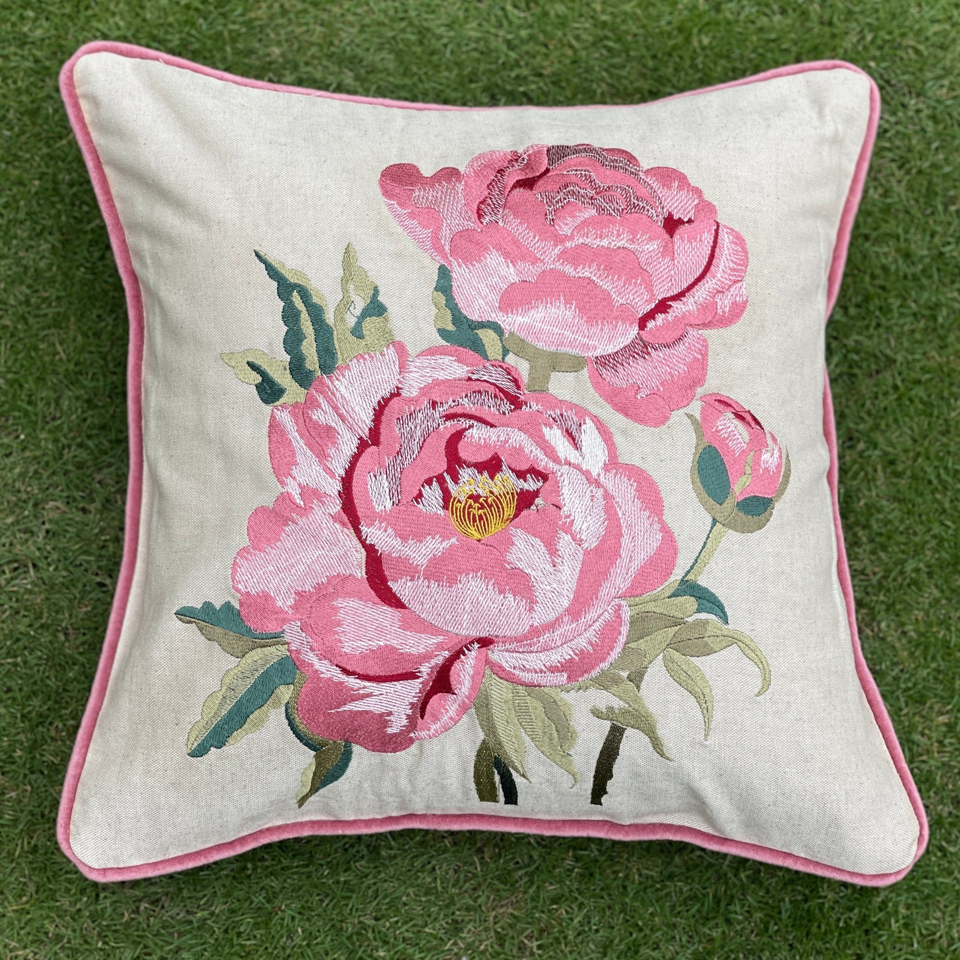 beige cushion cover with floral embroidery, ideal for living rooms
