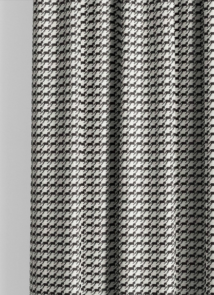 Close-up detail of ivory and black heritage houndstooth fabric