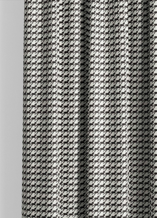 Close-up detail of ivory and black heritage houndstooth fabric