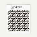 Ivory and black heritage houndstooth upholstery fabric swatch by Venia Home