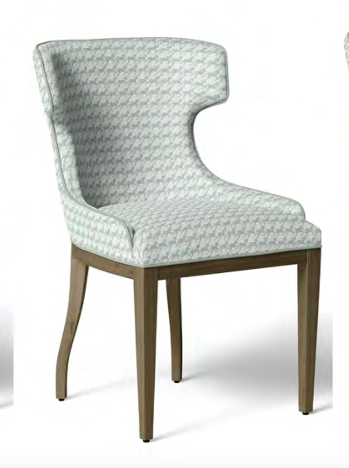 Close-up detail of ivory and jade green heritage houndstooth fabric