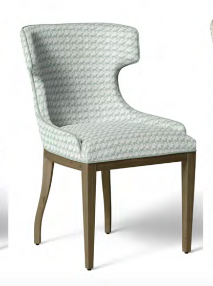 Close-up detail of ivory and jade green heritage houndstooth fabric