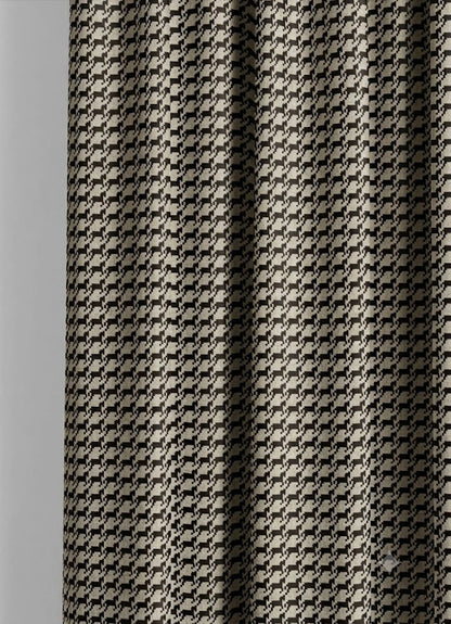 Close-up detail of taupe and black heritage houndstooth fabric