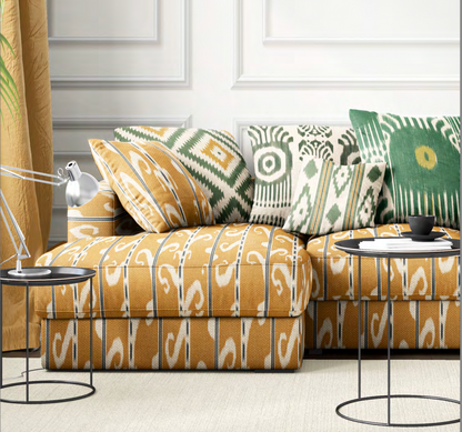 Close-up detail of yellow ikat scroll fabric