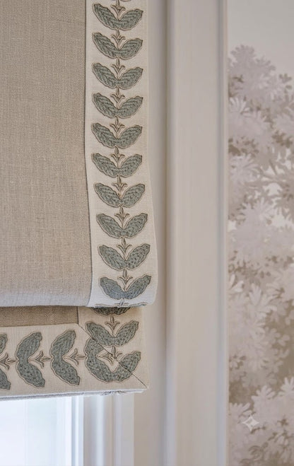 Close-up detail of leaf embroidered trim
