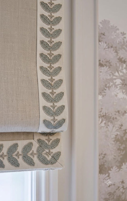 Close-up detail of leaf embroidered trim