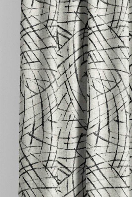 Close-up detail of ivory and black luna arcs fabric