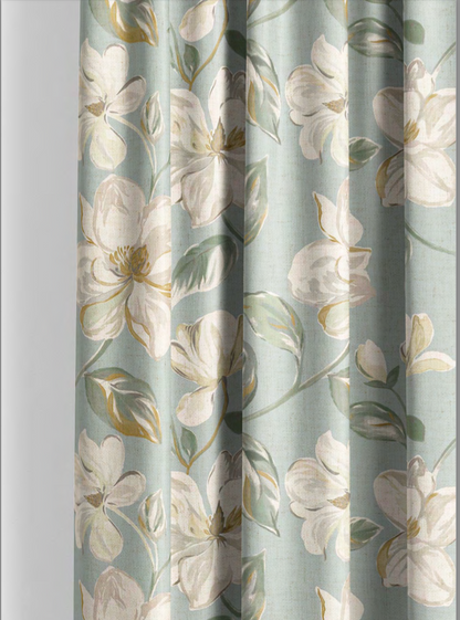 Close-up detail of aqua magnolia bloom fabric