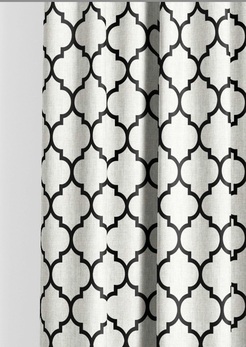 Close-up detail of ivory and black Moorish trellis fabric