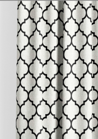 Close-up detail of ivory and black Moorish trellis fabric