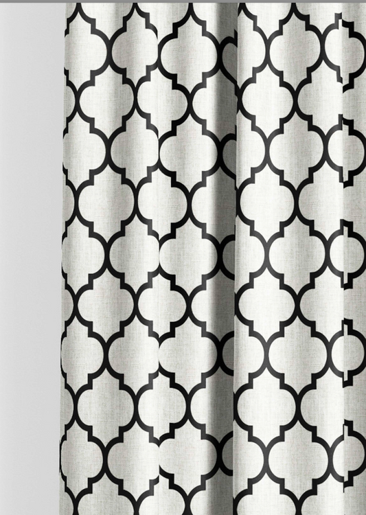 Close-up detail of ivory and black Moorish trellis fabric