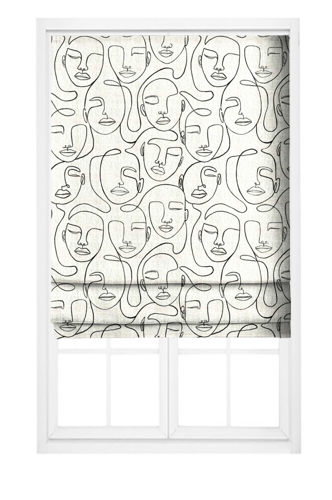 Close-up detail of ivory and black Muse faces fabric