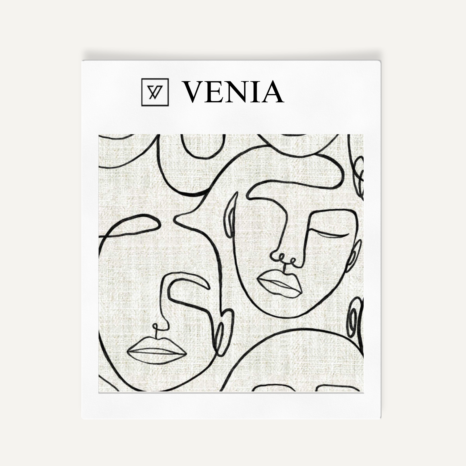 Ivory and black Muse faces upholstery fabric swatch by Venia Home