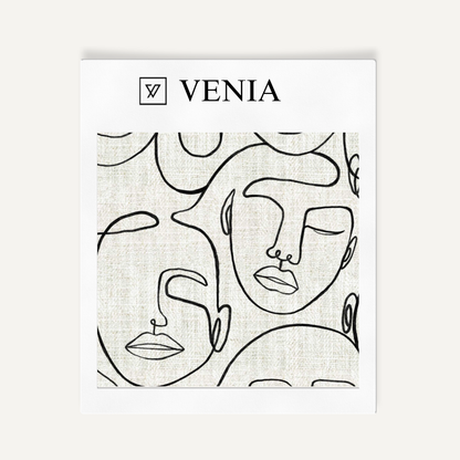 Ivory and black Muse faces upholstery fabric swatch by Venia Home