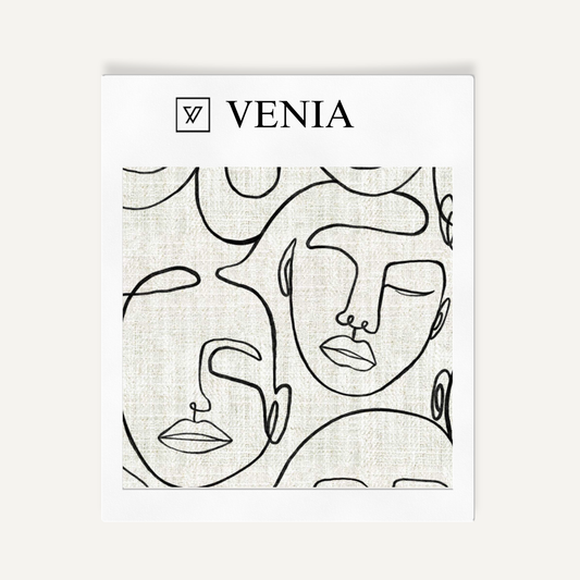 Ivory and black Muse faces upholstery fabric swatch by Venia Home